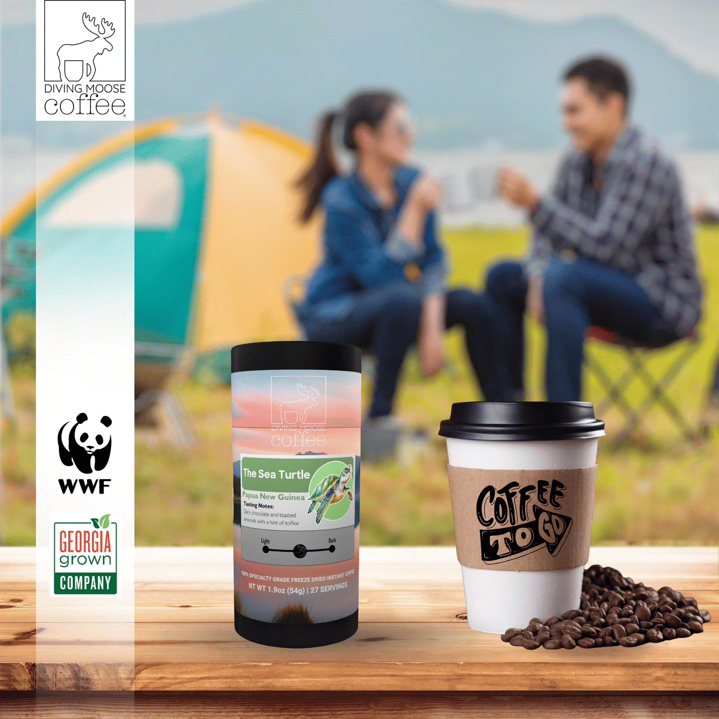 The Sea Turtle Papua New Guinea instant freeze dried coffee tube and to-go cup with coffee beans on wooden table, camping background