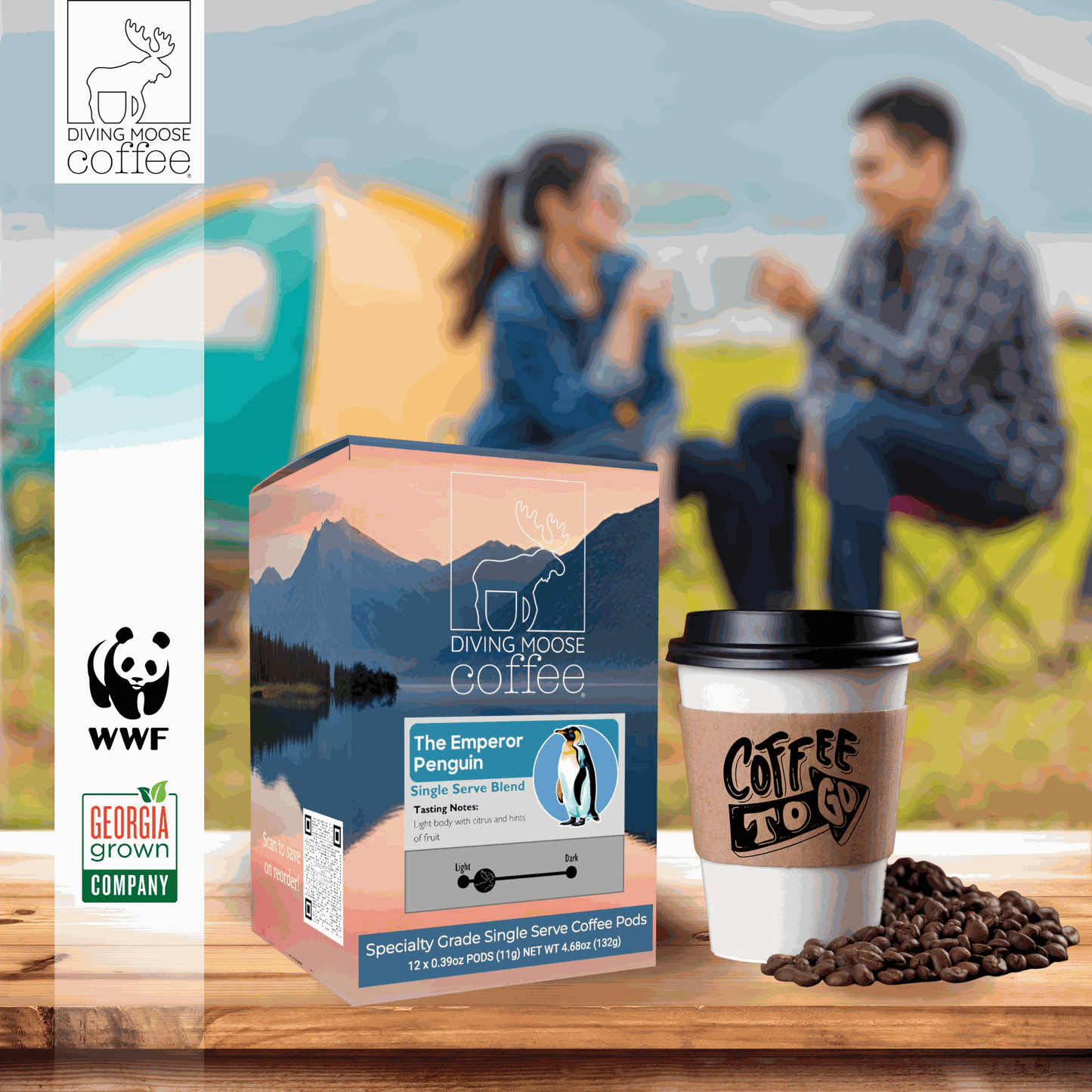 The Emperor Penguin light roast single serve coffee pods with bright citrus and dried fruit notes beside coffee cup and beans outdoors