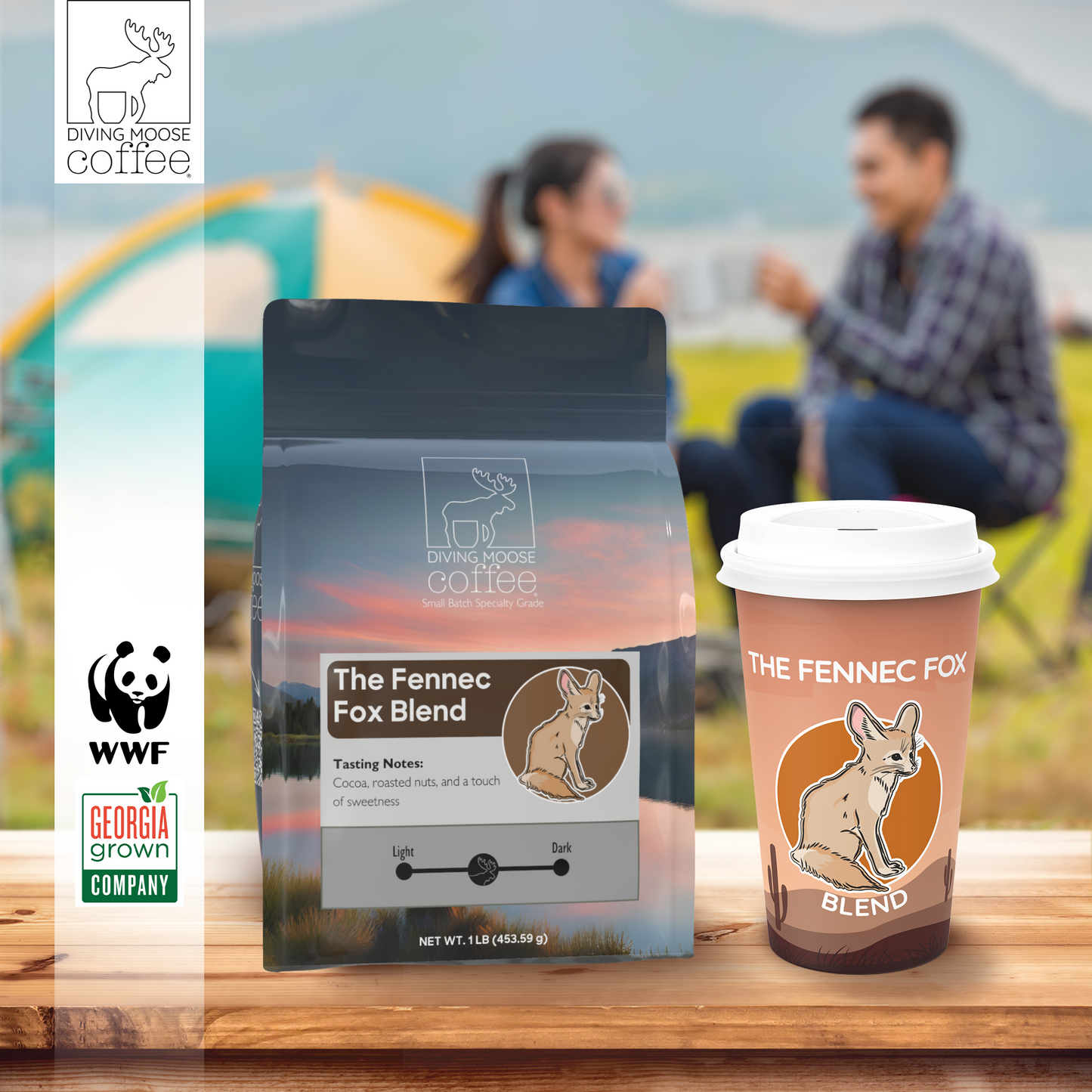 The Fennec Fox medium roast coffee blend with smooth, nutty, and cocoa flavor notes in branded packaging and cup on wooden table outdoors