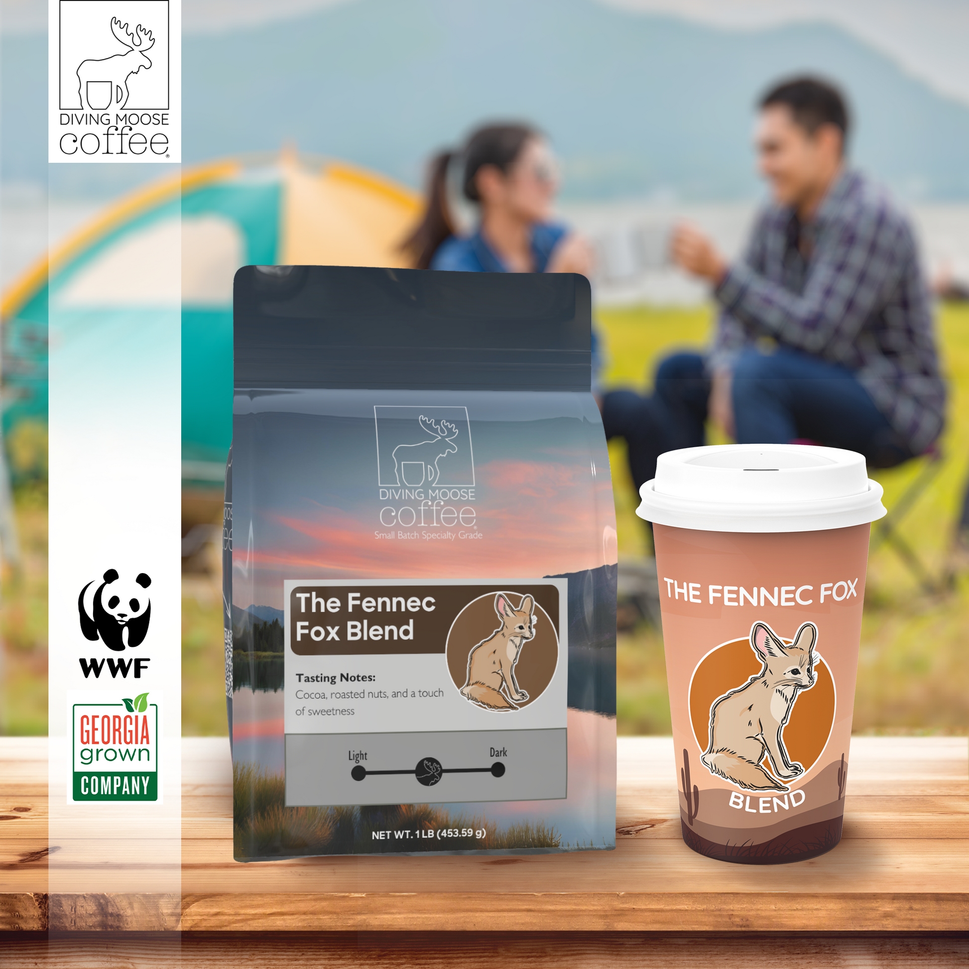 The Fennec Fox medium roast coffee blend with smooth, nutty, and cocoa flavor notes in branded packaging and cup on wooden table outdoors