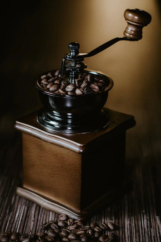 Manual coffee grinder with coffee beans for how to grind coffee beans without a grinder